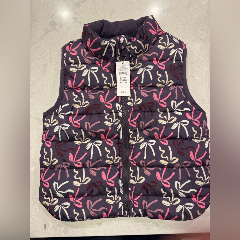 GAP Kids Puffer Vest with Pink and White Bow Pattern